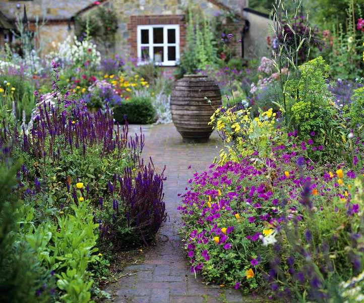 how to plan a cottage garden pot on tiled path