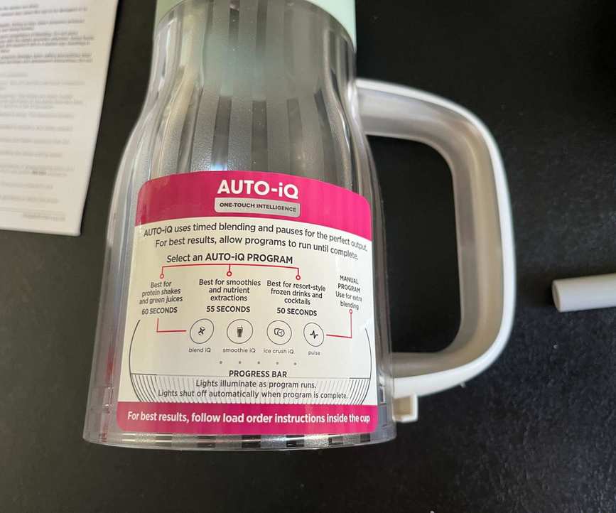 A close-up of the Auto-IQ instruction sticker.
