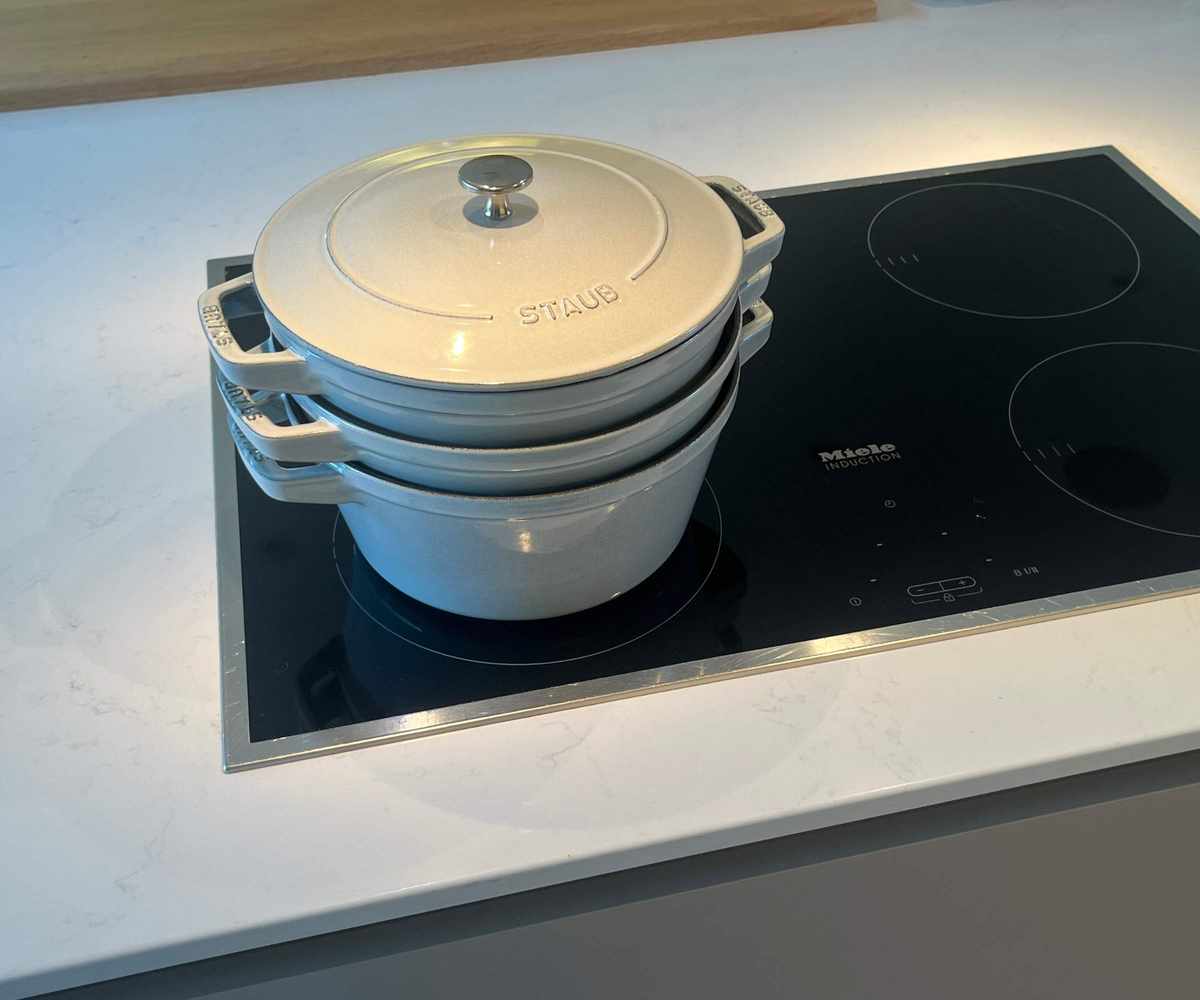 The 3 piece Staub stackable set on the induction stove