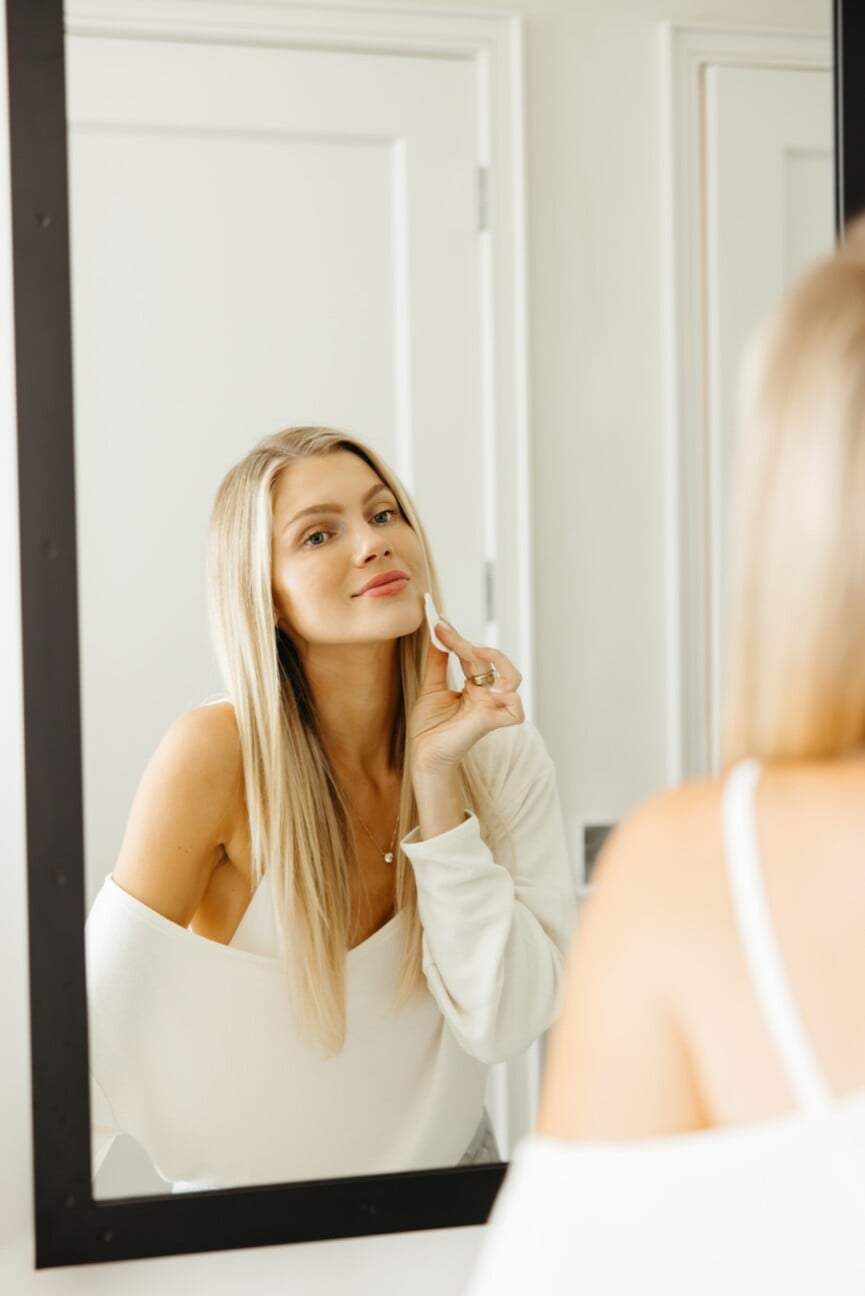 Woman doing makeup.