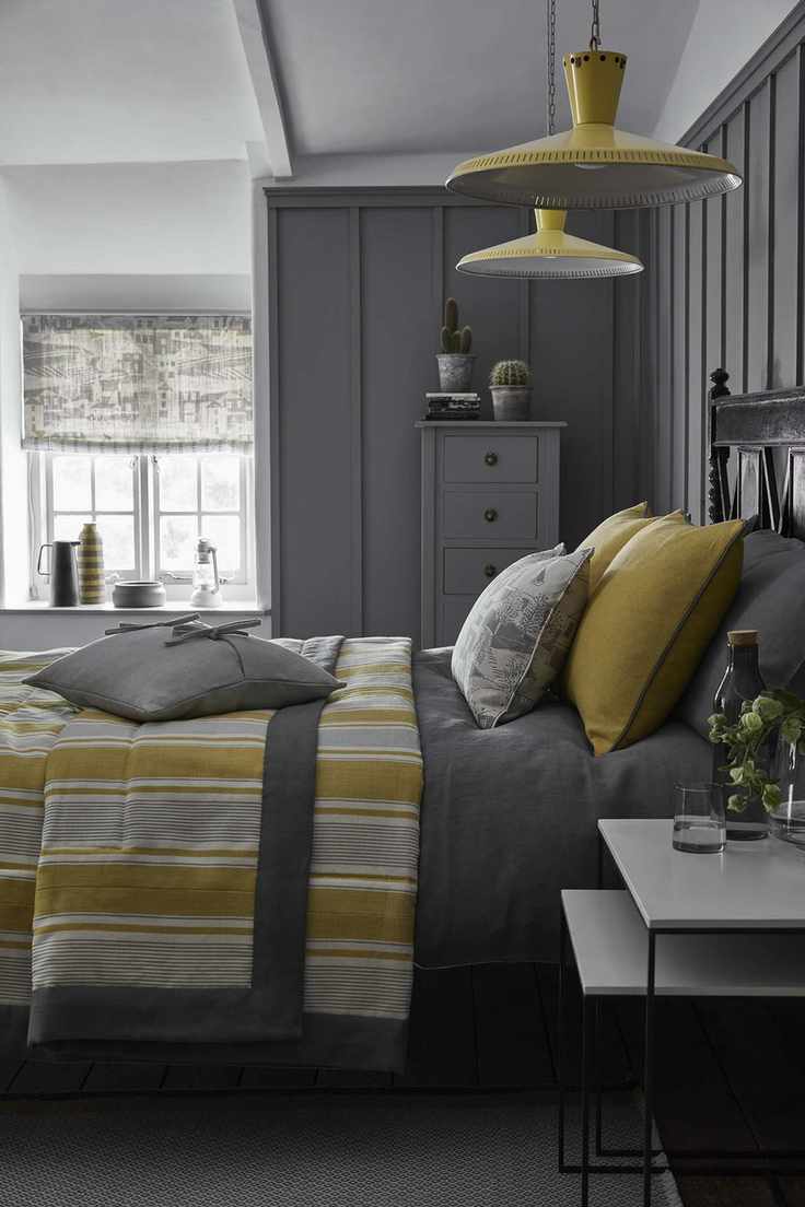 Cottage bedroom with modern paneling