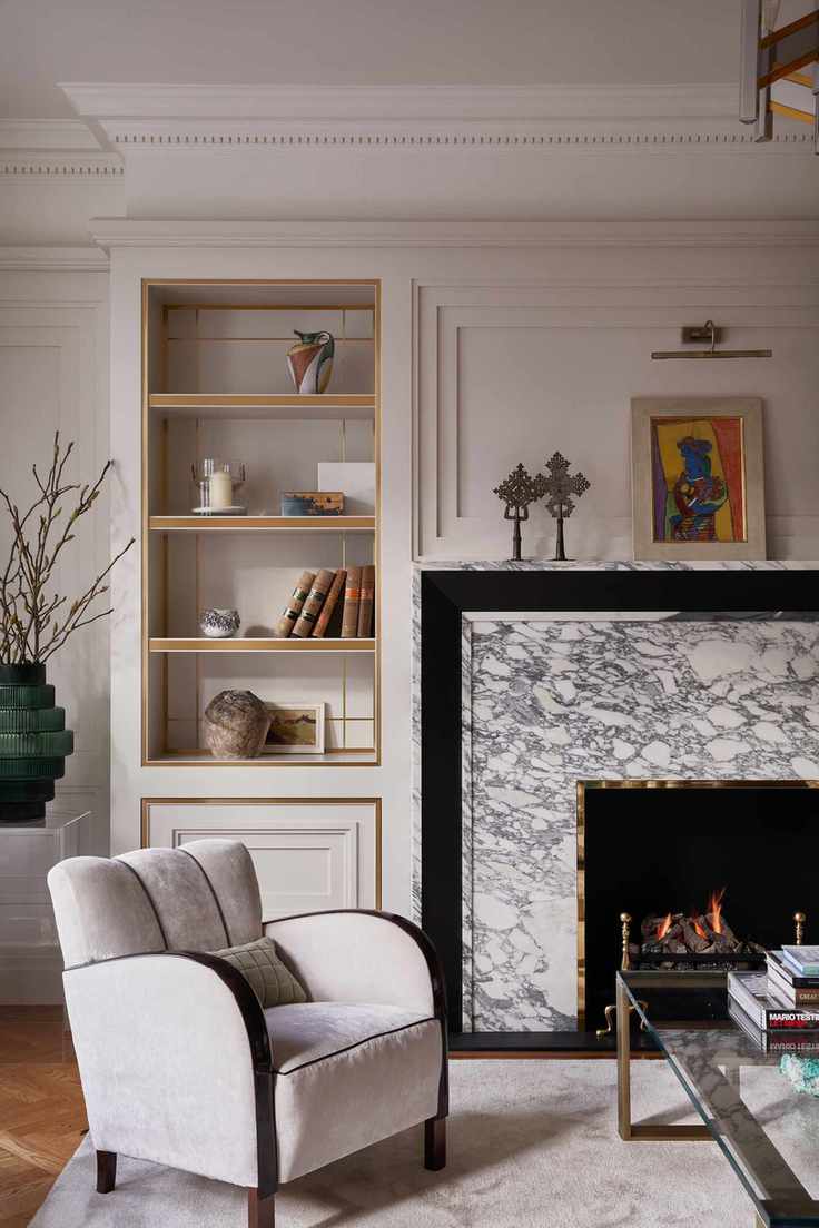 Neutral living room with elegant wood and marble features.