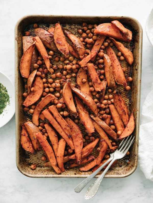 sweet potato chickpea bowl with feta yogurt and herbs