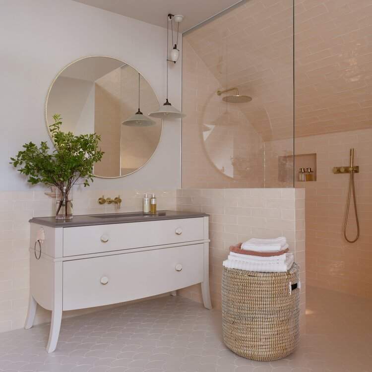Pastel pink bathroom with walk-in shower