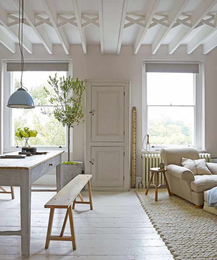 Rustic white living room with wood accents