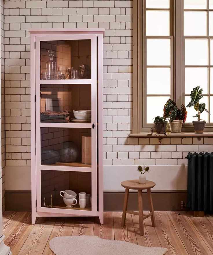 Slim glass-fronted dresser