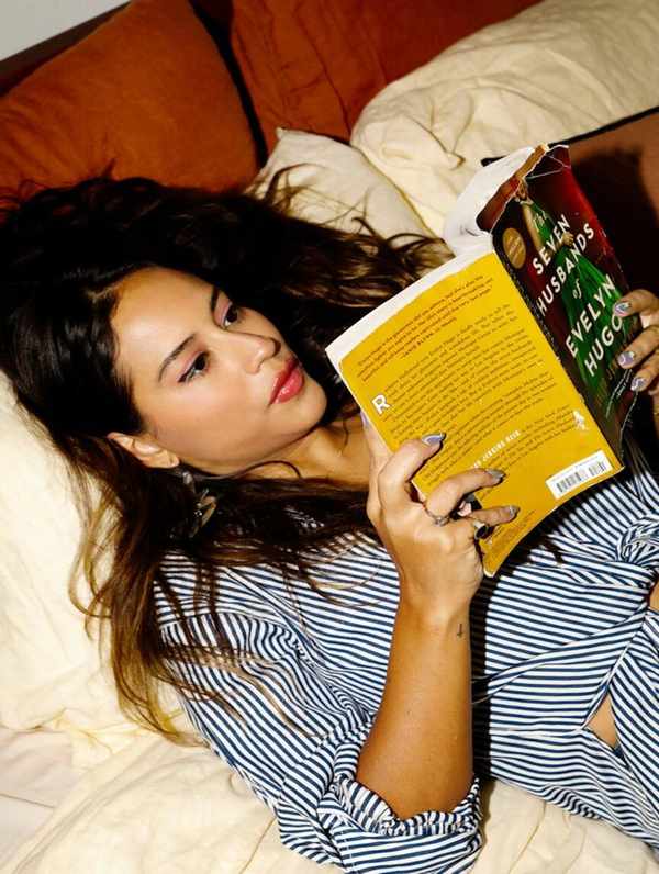 Woman reading in bed.