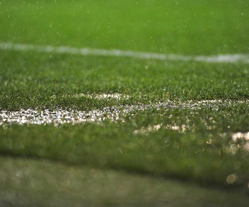 A close up of waterlogged turf