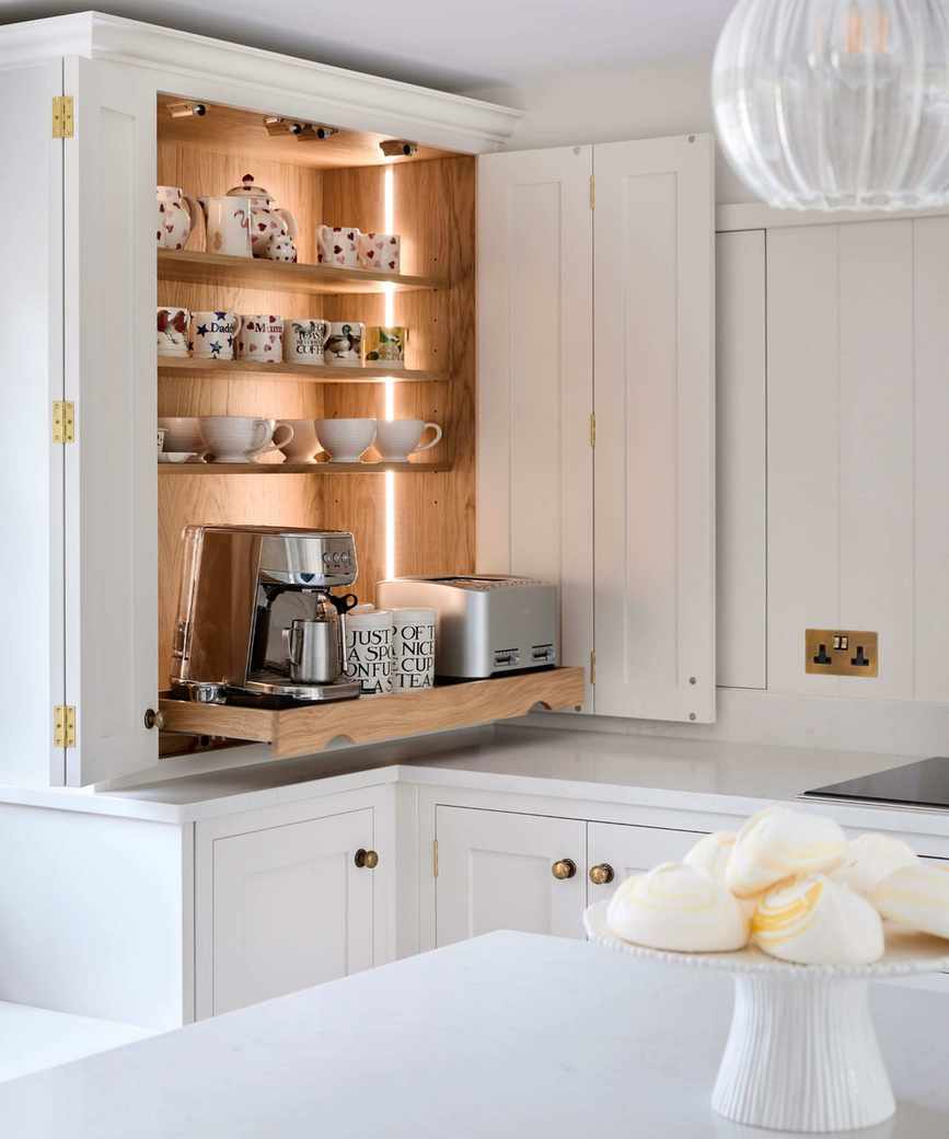 kitchen butlers pantry with pull out appliance breakfast station