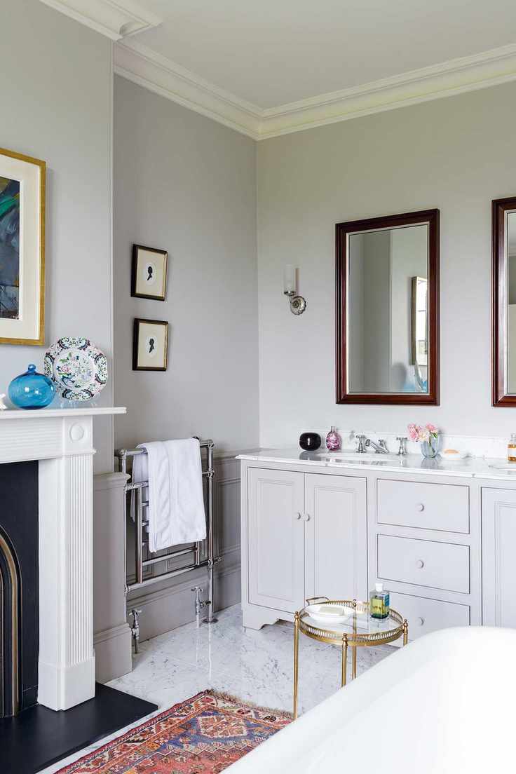 Traditional light grey bathroom vanity with marble top in grey bathroom