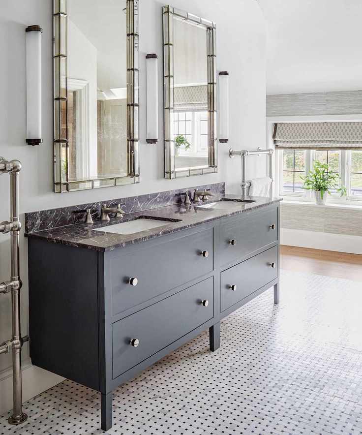 Sleek bathroom with storage cabinets