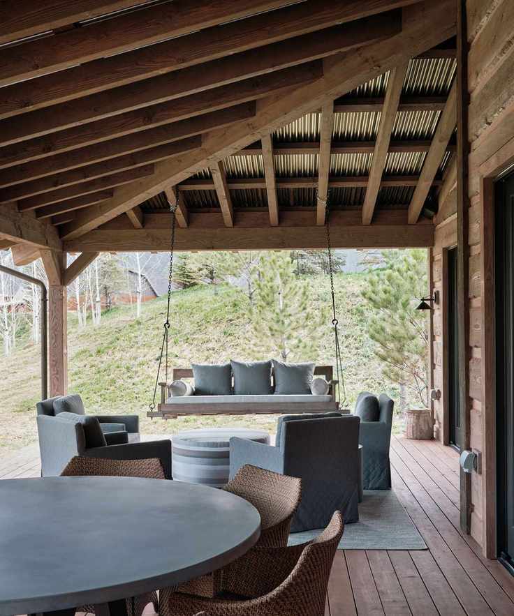Stylish porch combining wood and metal materials