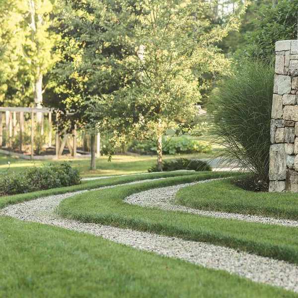 Gravel and grass ribbon driveway
