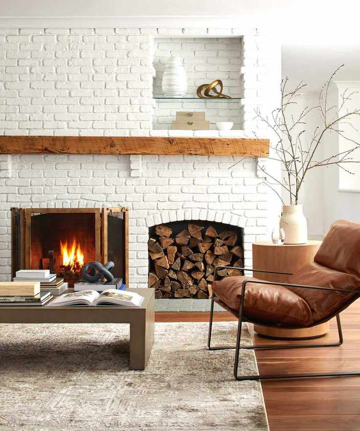 kathy kuo painted exposed brick living room design