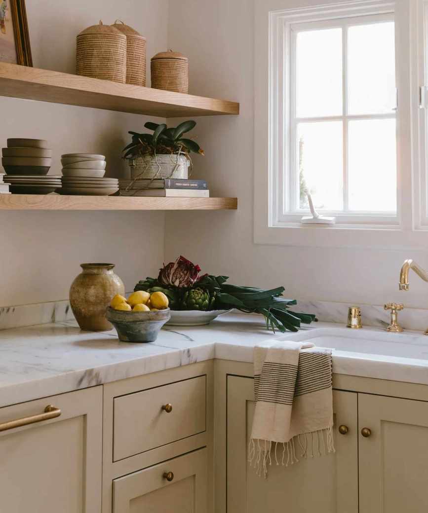 Neutral beige kitchen with marble countertop