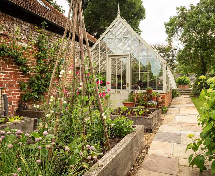 lean to greenhouse in vegetable garden