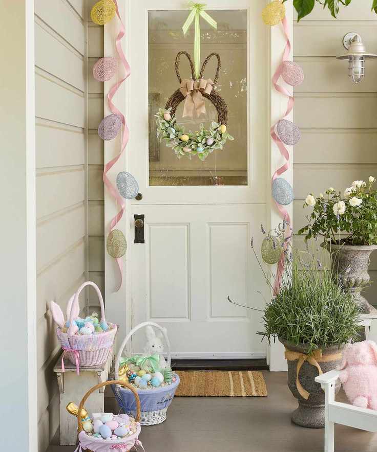 Easter porch with white door, easter egg wreath, bunting and baskets