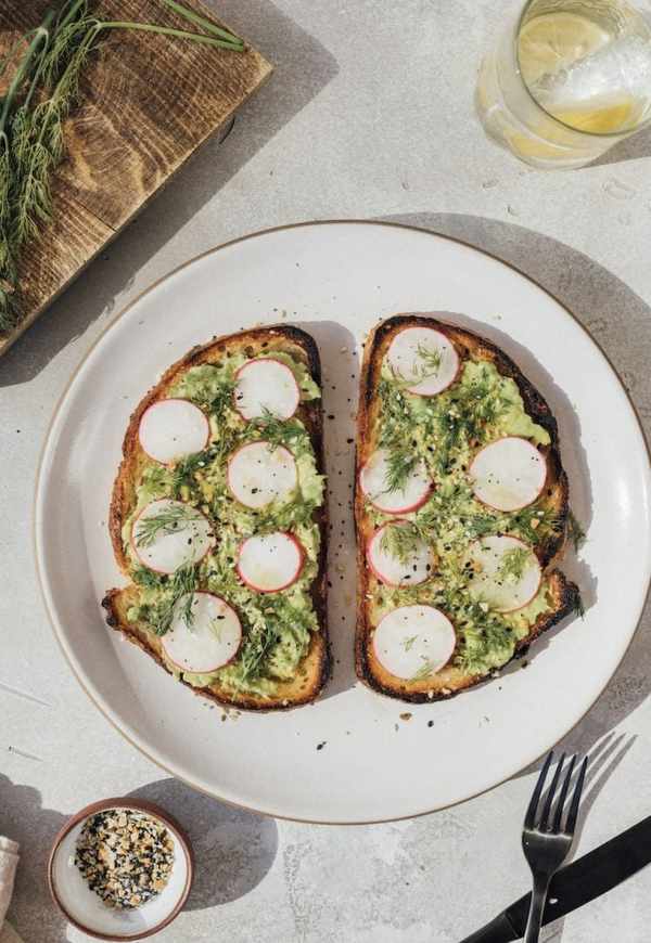 avocado toast with kale pesto and crunchy veggies