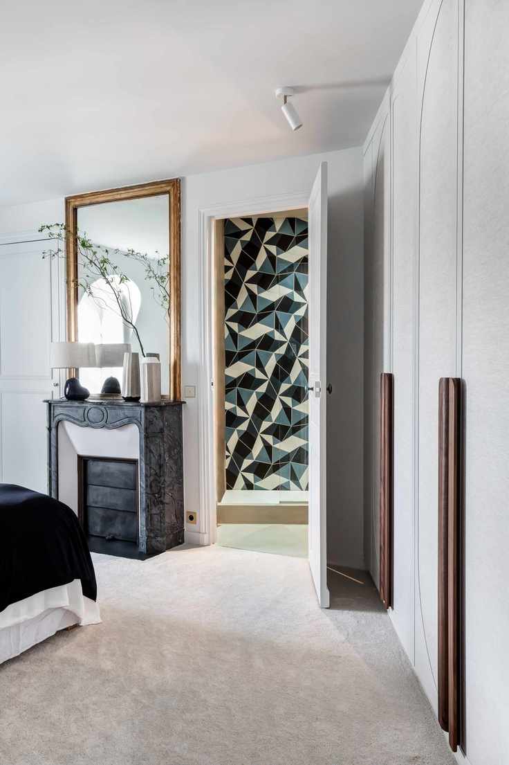 Geometric blue and white tile wall design