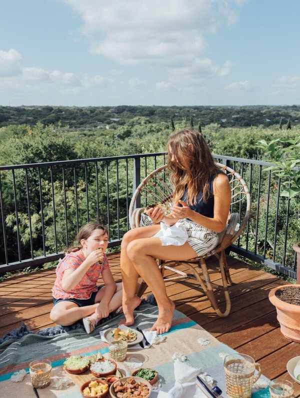 family enjoying tacos al pastor outdoors