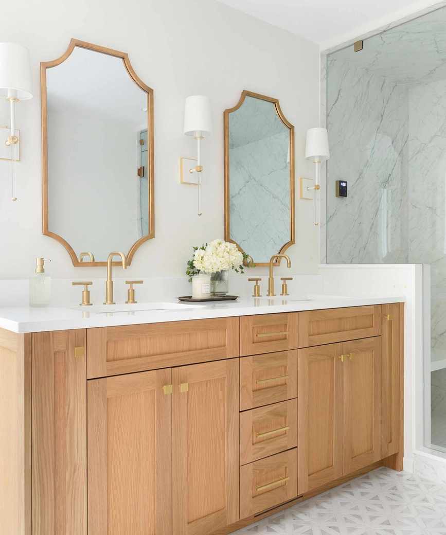 A guest bathroom with a wooden double vanity