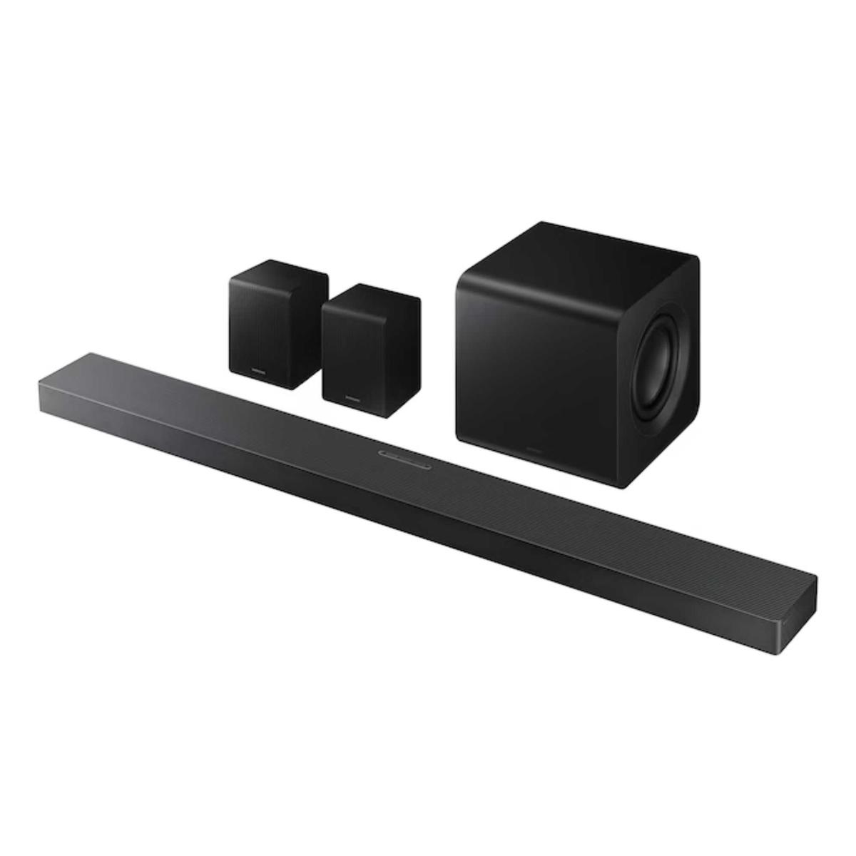 Samsung HW-QS750F soundbar, woofer, and two surround speakers against white background.