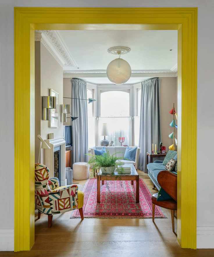 Living room accent wall with painted door frame