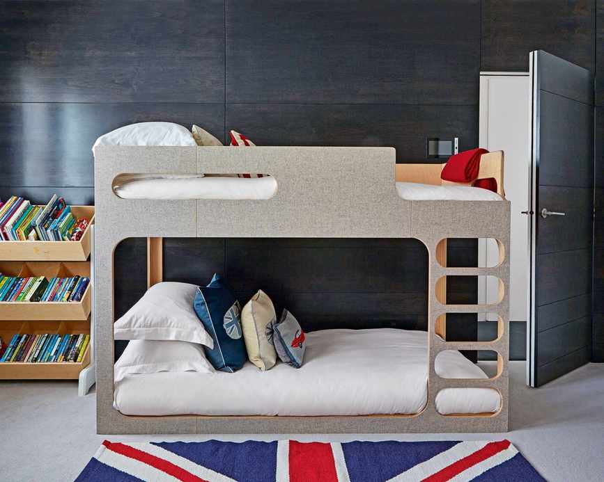A modern kids' room with a simple loft bed