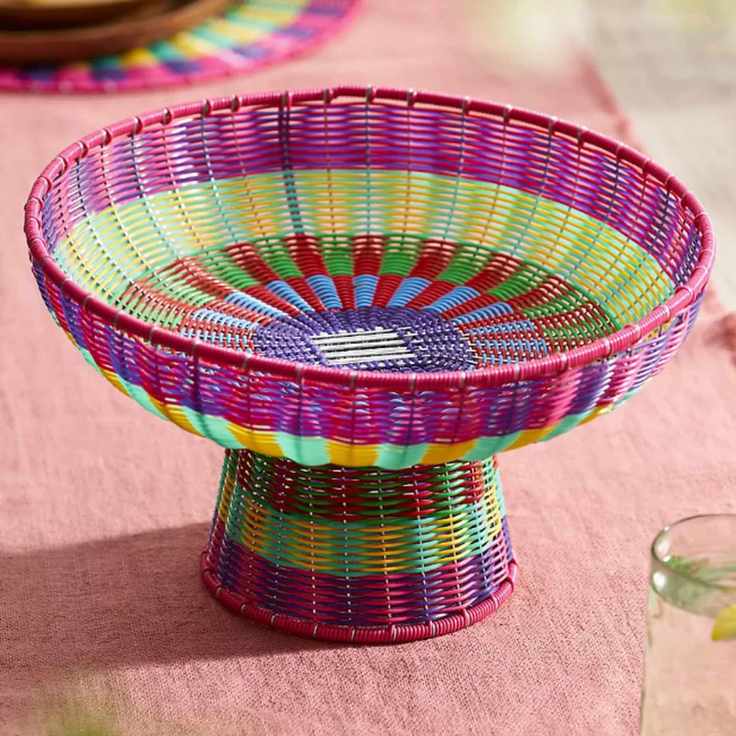 Brightly colored woven fruit bowl