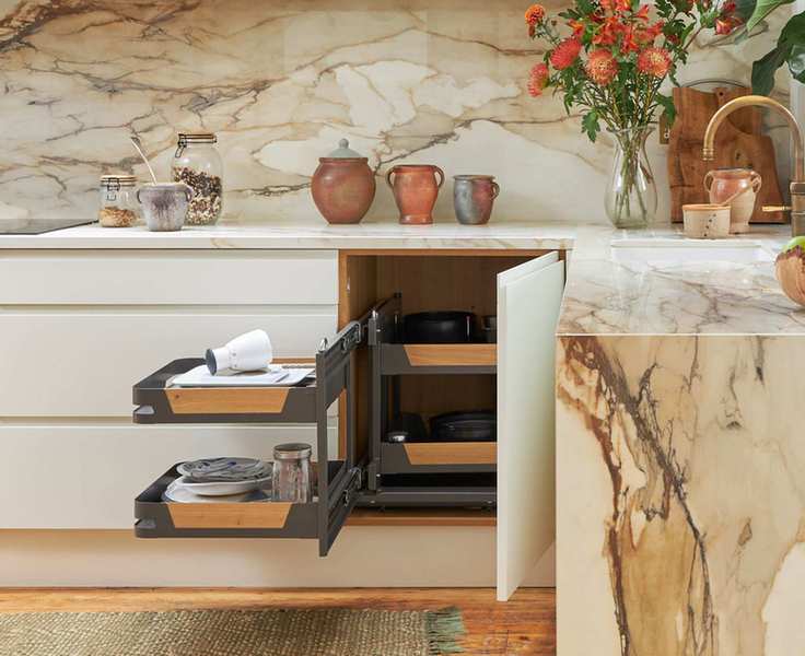 kitchen with pull out unit in corner cabinet
