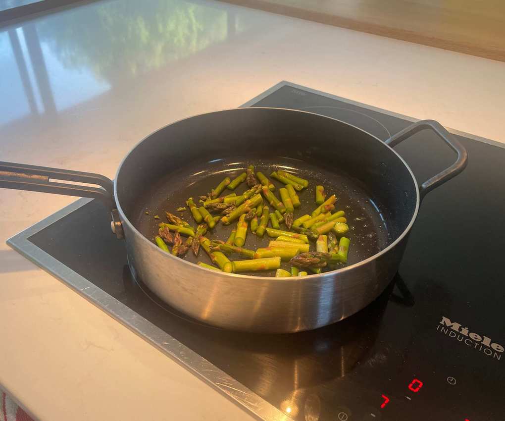 Frying asparagus in Stanley Tucci's pan on my induction hob