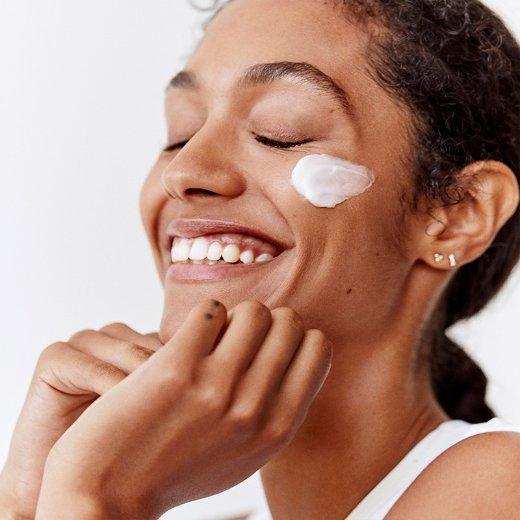 fresh-skincare-intro-blog-2.png Woman with Fresh Rose Deep Hydration Face Cream on Cheek