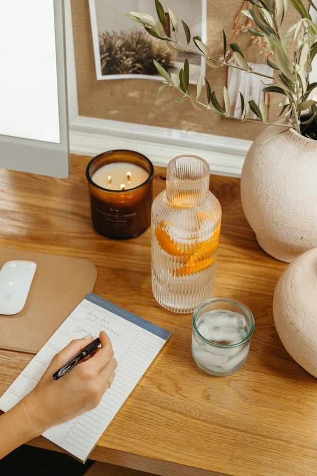 taking notes at desk