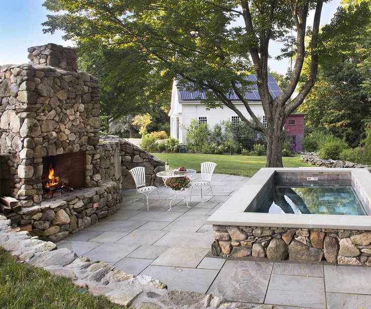 garden with plunge pool from Soake Pools and fire place