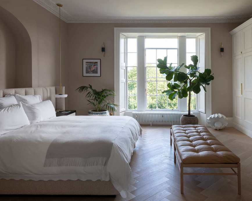 Leather daybed in a master bedroom