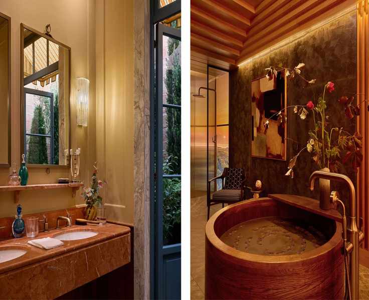 Luxurious bathrooms side by side: one with a warm-toned vanity and pink marble; the other featuring a round wooden soaking tub with dark textured walls.