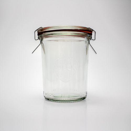 Small cylindrical jar with an orange seal and two metal clamps
