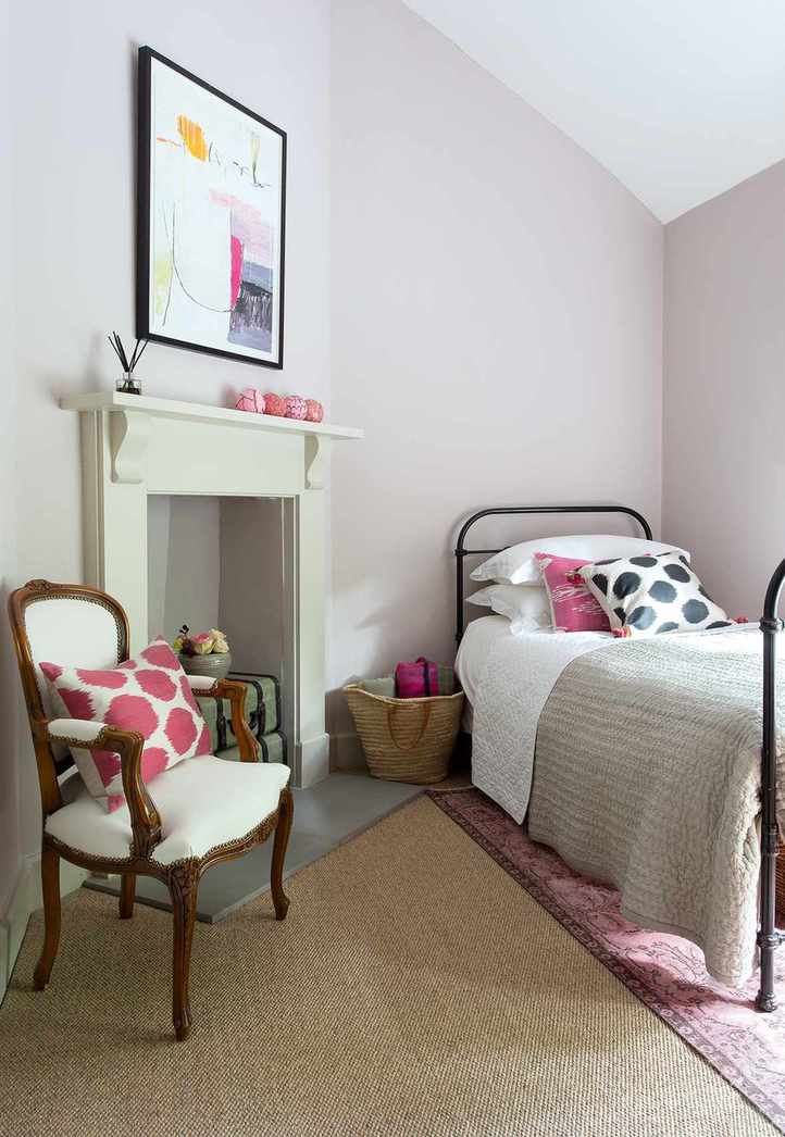 Cottage bedroom with pink and green accents