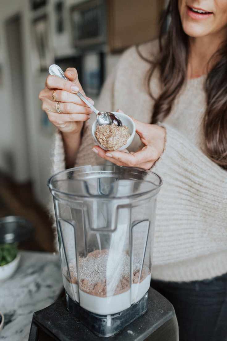 Kelly LeVeque making protein smoothie