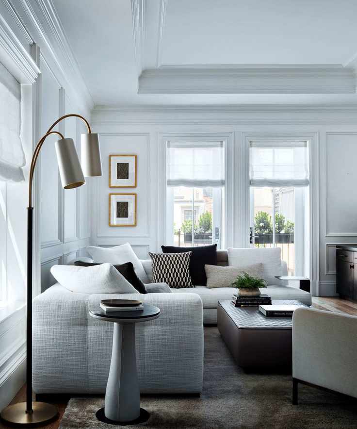 family room with white sofas