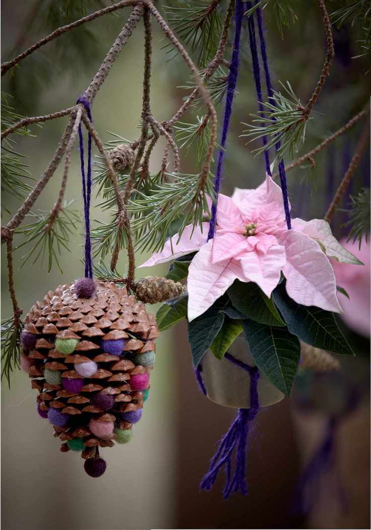 Pine cone decorated with felt balls