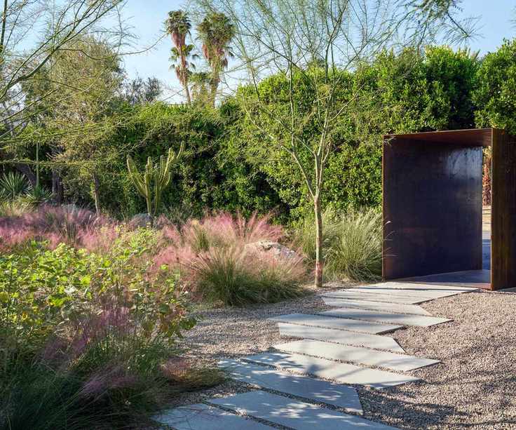 front yard with gravel path and drought-tolerant plants