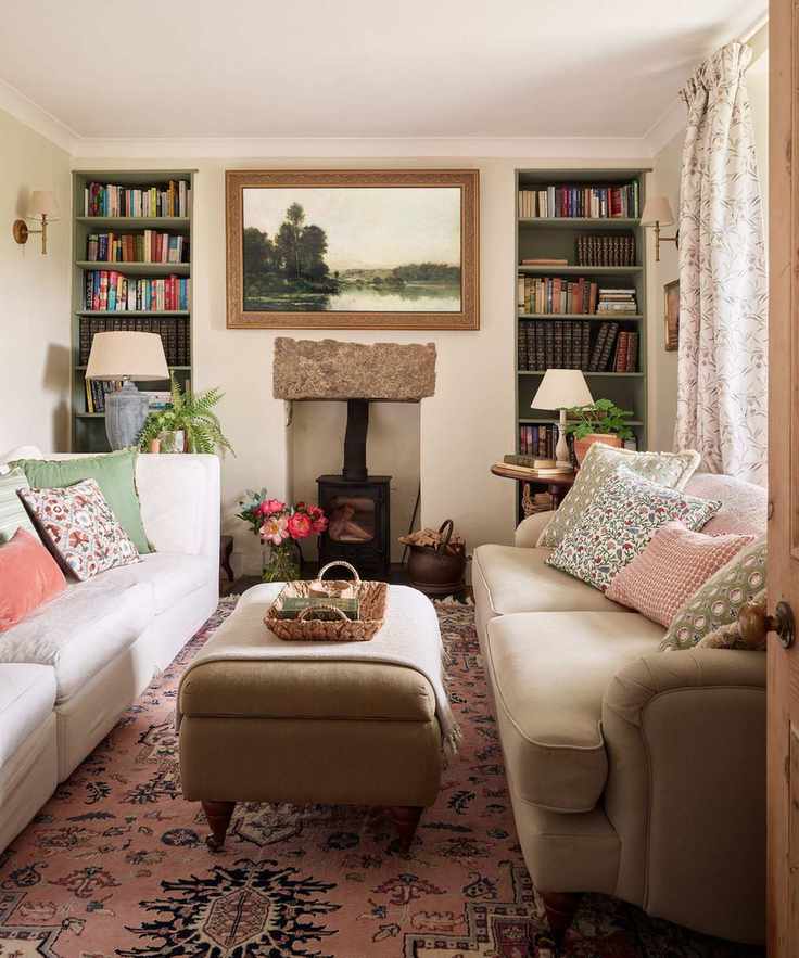 Traditional living room with cream sofas ottoman and patterned cushions