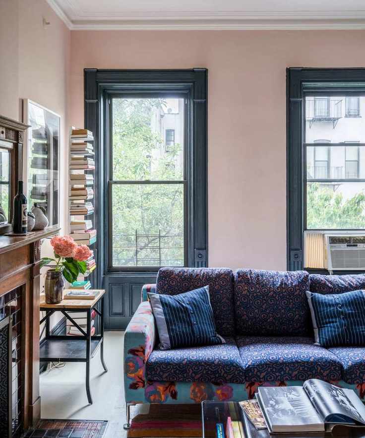 Pink living room with dark blue accents