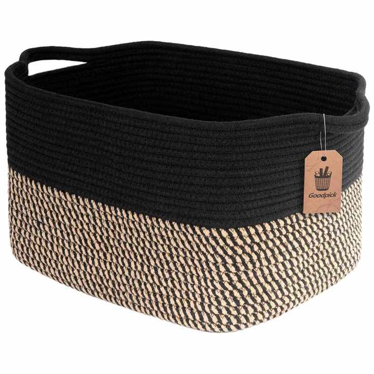 A black and tan rectangular woven storage basket with integrated handles