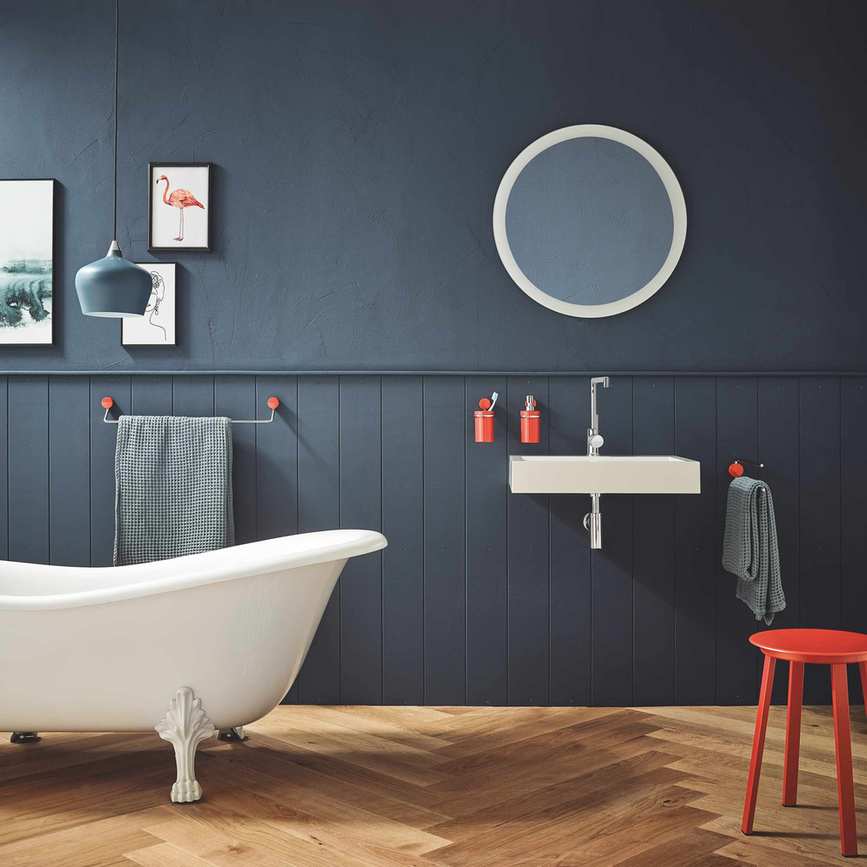 Family bathroom with green walls and white rolltop bath