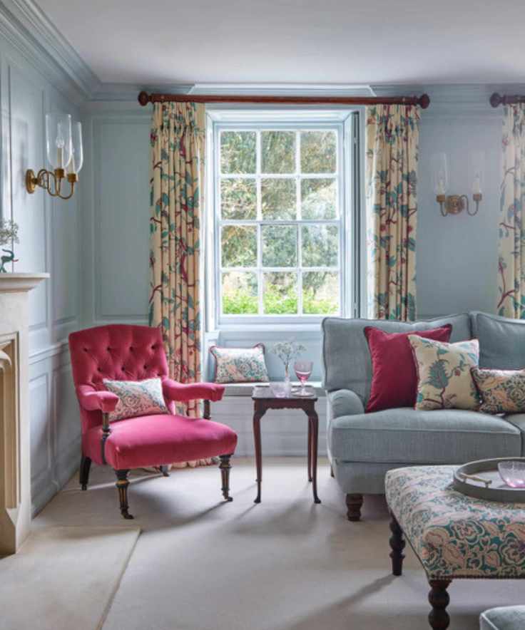 Blue living room with floral curtains