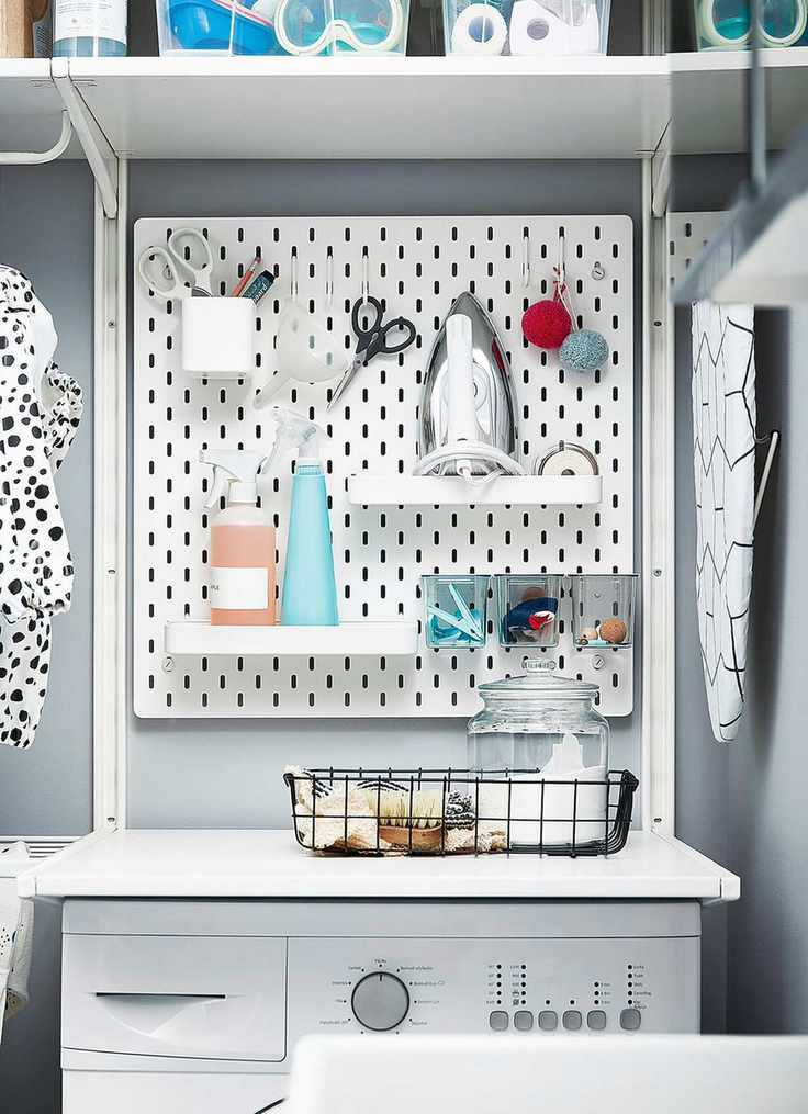 White SK&amp;Aring;DIS pegboard in a laundry room