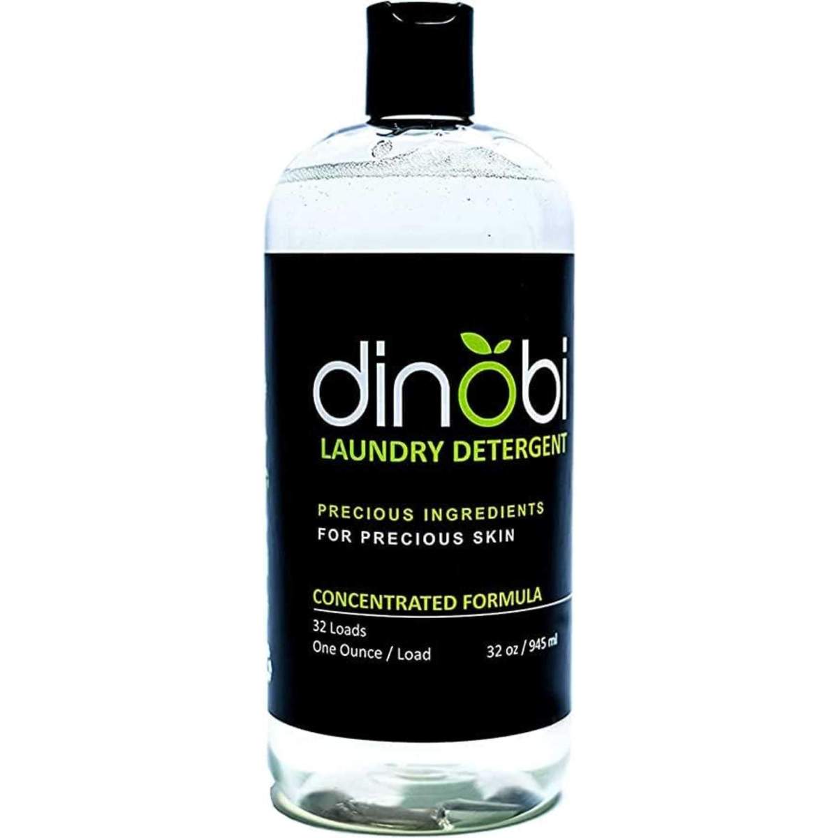 A clear bottle of laundry detergent with black label