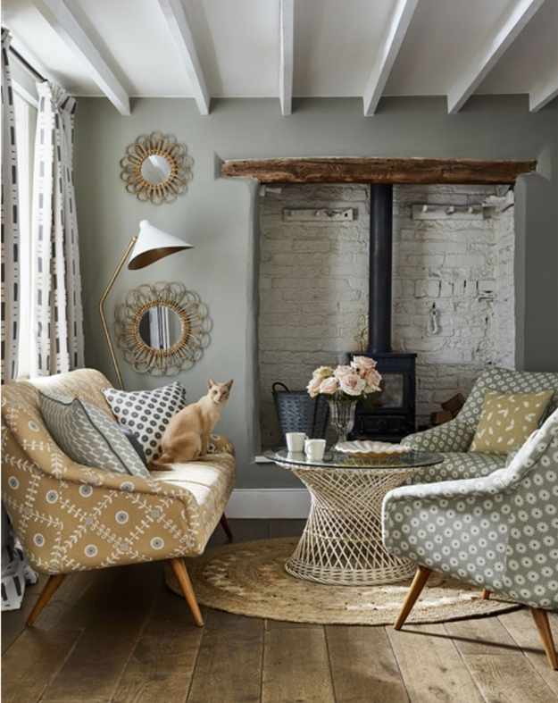 Country living room with beams and stove